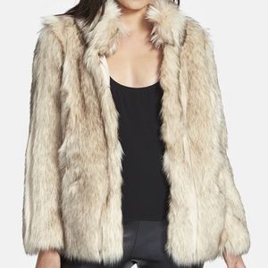 TopShop faux fur coat. Never worn. Feels real!